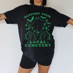 ✿ 'support your local cemetery' Cute Unisex T-Shirt ✿Details: * Comfort Colour heavyweight 100% cotton t-shirt * Relaxed fit * Garment dyed and pre shrunk, giving a naturally lived in look * Soft cotton with more of a structured fit * Graphic is printed using a direct to garment dye, similar to screen printing, giving a more lived in/vintage look than a stiff vinyl press on. Still with a crisp and clear image. ✿Check out my other shirts here: https://www.etsy.com/ca/shop/Terriblay?section_id=284 Fitted Pre-shrunk Shirt, Vinyl Screen Printing T Shirts, Horror Ghost, Final Girl, Comfort Color, Halloween Horror, Support Local, Halloween Art, Halloween Funny