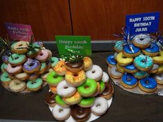 there are three different types of doughnuts on the table together, each with a happy birthday sign