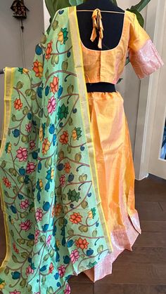 Pure Mangalagiri Silk Cotton Lehenga with pen kalamkari silk cotton Dupatta. Silk Cotton Lehenga with zari borders. Lined skirts and blouse , double lined. Color : yEllow with pink silver zari Blouse size :36 goes upto 39 Skirts - 36-40. Duppatta: pen kalamkari hand painted silk dupatta Silk Tilla Dupatta For Designer Wear, Semi-stitched Sharara With Kalamkari Print Traditional Drape, Designer Wear Sharara With Kalamkari Print In Traditional Drape, Designer Wear Sharara With Kalamkari Print, Silk Tilla Sets For Diwali, Silk Sets With Tilla Details For Diwali, Designer Chanderi Sharara With Kalamkari Print, Designer Chanderi Lehenga With Kalamkari Print, Traditional Kalamkari Print Lehenga For Designer Wear