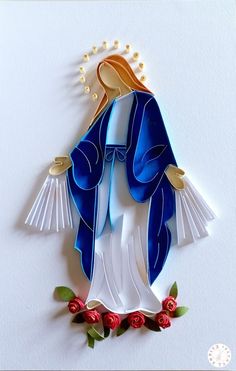 a paper cut image of the immaculate mary with flowers and pearls on her head is shown