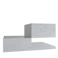 two white marble blocks sitting on top of each other in front of a white background