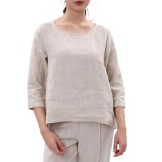 PRICES MAY VARY. Made of 100% linen fabric, pre-shrunk The linen shirt featuring a crew neck, three quarter sleeve, solid color, relaxed fit Easy to match any clothing. Such as any linen pants/ short, jeans, leggings and so on This linen tops is perfect suitable for hot weather. Linen being highly absorbent fabric, the tops will allow your body to breathe and feel at ease. And the more you wear and wash it the more it will gain in its character and softness. Machine washable. Please refer to the Casual Summer Tops, Hot Weather, Linen Top, Linen Women, Three Quarter Sleeves, Linen Pants, Linen Shirt, Summer Casual, Casual Tops