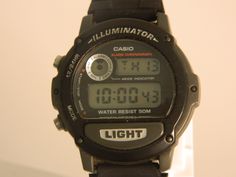 Vintage Casio Illuminator Digital Watch Men Black Tone - Chronograph Backlight - 44mm 1536 W-87H This Vintage Casio Illuminator Digital Watch (model 1536 W-87H) offers timeless functionality and style. Featuring a 44mm black tone case, this watch is perfect for men who appreciate a retro aesthetic with modern conveniences. The built-in Illuminator backlight ensures easy reading in low-light conditions, while the chronograph function allows precise time tracking.     Brand: Casio     Model: W-87H (1536)     Case Size: 44mm     Features: Digital display, backlight, chronograph, alarm, water-resistant     Design: Sleek black tone for a bold, stylish look     Condition: Excellent vintage condition and fully functional This Casio Illuminator is a true classic that's still highly sought after by Vintage Watches With Analog Display For Outdoor, Vintage Outdoor Watches With Analog Display, Vintage Outdoor Watch With Analog Display, Vintage Black Watch With Stopwatch, Vintage Black Digital Watch With Stopwatch, Vintage Black Digital Watch With Analog Display, Vintage Black Outdoor Watch, White Analog Digital Watch For Outdoor, Vintage Black Outdoor Watches