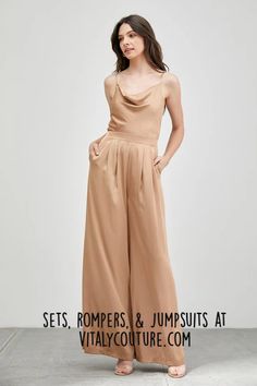 Shop Our Catalog of Women Sets, Rompers & Jumpsuits by Vitaly Couture | Women Outfits | A perfect blend of sophistication and texture that adds a touch of elegance to your wardrobe. This jumpsuit features a cowl neck design with intricate trim detailing, meticulously woven to create a unique and visually captivating ensemble. women fashion sets | skirt and tops | pants and tops | shorts and tops | rompers | rompers for women | denim rompers | chic rompers | classy rompers | jumpsuits for women | classy jumpsuits | date night outfits | date night rompers | date night jumpsuits | fashion for women | chic style | classy style | wpmens outfits Jumpsuits For Women Classy, Skirt And Tops, Classy Romper, Chic Romper, Classy Jumpsuit, Rompers For Women, Women's Fashion Set