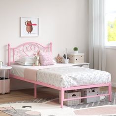 a child's bedroom with pink furniture and accessories on the floor, including a bed