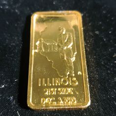 a gold bar sitting on top of a table