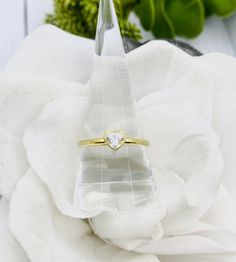 This beautiful and dainty 14K yellow gold over 0.925 solid sterling silver ring has a 5x5mm heart moissanite center stone. The ashes are set behind the stone. You may be able to see the ashes through the stone depending on the ash color.  PLEASE SEND YOUR ASHES WITHIN 2 WEEKS OF PLACING YOUR ORDER. IF I DO NOT RECEIVE THEM IN A TIMELY MANNER YOUR ORDER MAY BE CANCELLED AND YOU MAY NEED TO REORDER. **These are for pet/animal ashes. Etsy's policy does not allow jewelry made with human cremains. If Dainty Heart Cut Stackable Rings Gift, Gold Heart Ring With Round Cut As Gift, Gold Heart Ring With Round Cut For Gifts, Dainty Heart Cut Stackable Rings For Anniversary, Diamond Stackable Heart Ring Perfect As A Gift, Stackable Diamond Heart Ring Perfect For Gift, Stackable Diamond Heart Ring As Gift, Gold Heart Cut Stackable Rings As Gift, Gold Heart Cut Stackable Rings Gift