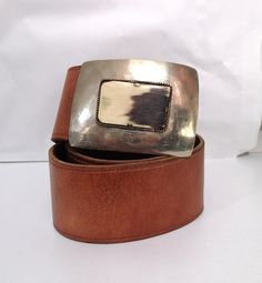 Vintage Brown Leather Belt, Boho Woman Leather Belt, Camel Belt, Waist Leather Belt, Metal and Bone buckle, Texan Style  The belt is in very good condition, a little bit signs of wear and use Wide: 5 cm/ 2 in Lenght: 107 cm / 42 in Fit to waist: 88-99 cm / 36-39 in Materials: leather Condition: very good vintage condition At the customer's request, additional holes can be made for a smaller waist See more like this in my shop: https://www.etsy.com/shop/VintageInsparation?ref=seller-platform-mcna Boho Woman, Smaller Waist, Brown Leather Belt, Boho Women, Small Waist, Upcycle Clothes, Vintage Brown, Leather Belt, Leather Women