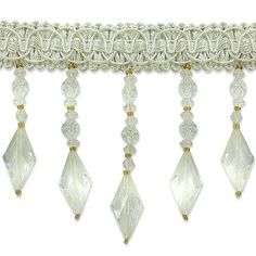 the beaded trim is white and has crystal beads hanging from it's sides