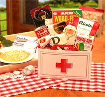 a wooden tray filled with food on top of a table next to a red cross sign