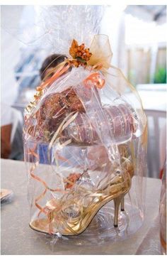 a woman in high heel shoes wrapped in plastic