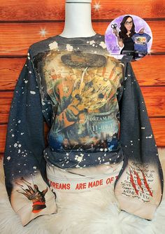 Scary Sweatshirt, Freddy Krueger Crew Neck Sweater, Bleached Sweater, Custom Halloween Sweater, Halloween Sweatshirt, Horror Sweatshirt Handmade, custom in a small Pennsylvania town.  All items are handmade with love 💗Custom Bleached, Super comfortable Gilden Softstyle sweatshirt. Sublimation printed design. Bleach pattern may vary.  Please see the sizing chart pictured above or message us with sizing questions.  We unfortunately do not accept returns due to the custom made nature of the shop, but if there is an issue with your purchase, please feel free to contact me and we will do the best we can to help. Horror Sweater, Bleached Sweater, Horror Sweatshirt, Freddy Krueger Sweater, Bleached Tees, Halloween Sweater, Ghost Faces, Freddy Krueger, Halloween Sweatshirt