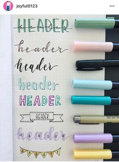 some pens are lined up on top of a notebook with the words, leader and leader