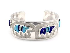 Sterling silver with lapis, turquoise and opal, 1" wide, size 6 3/8 TO SHIP IN 2-3 WEEKS Southwestern Blue Nickel-free Cuff Bracelet, Southwestern Style Nickel Free Blue Cuff Bracelet, Southwestern Style Blue Nickel-free Cuff Bracelet, Blue Inlay Bracelet Jewelry, Unique Blue Nickel-free Cuff Bracelet, Blue Polished Bracelet Jewelry, Blue Inlay Bracelet, Blue Bangle With Polished Finish, Blue Multi-stone Bangle Jewelry