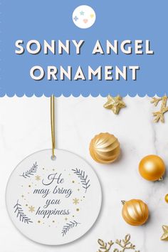 an angel ornament with gold ornaments around it and the words, he may bring your happiness