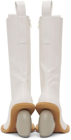 Calf-high buffed faux-leather boots in white. · Pull-loops at collar · Zip closure at inner side · Logo embossed at heel tab · Sculptural heel with rubber injection · Neolite foam rubber sole · Heel: H3.75 Supplier color: White/Grey Faux Leather Boots, White Love, Leather Boots, Vegan Leather, Rubber Sole, Color White, Faux Leather, Top Brands, Luxury Fashion