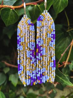 Floral Design Beaded Fringe Earrings Made of Miyuki Beads in Blue and Purple colours (сolors may vary due to your screen settings) Length- 9 centimeters Width - 2.5 centimeters Earrings are perfect as a gift. Ear clasp- you can choose between options brass ear wire in silver color or 925 sterling silver clip on. Occasion - any occasion to enjoy your life and decorate every day with bright details. Blue Beaded Earrings With Gold Beads For Festivals, Purple Beaded Earrings With Round Beads For Festival, Festival Purple Beaded Earrings With Round Beads, Beaded Fringe Earrings, Blue Floral Design, Enjoy Your Life, Miyuki Beads, Beaded Fringe, Fringe Earrings