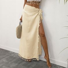 Season:Summer; Fabric:Polyester; Dress Length:Maxi; Gender:Women's; Style:Fashion,Casual,Beach Wear; Occasion:Beach,Vacation; Fit Type:Regular Fit; Waistline:High Waist; Pattern:Solid Colored; Design:Tassel Fringe; Pants Type:Wrap Skirt,Skirt; Front page:FF; Listing Date:01/17/2024; Production mode:External procurement; Hips:; Length:; Waist: Long Beach Skirt, Long Chiffon Skirt, White Long Skirt, Knit Shirt Dress, Fringe Fashion, Coverup Skirt, Womens Maxi Skirts, Split Skirt, Long Skirts For Women