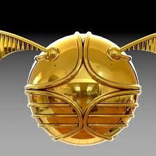 an image of a golden object with wings