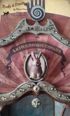 an old fashioned wooden box with a rabbit on it