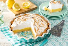 a lemon meringue pie on a table