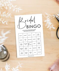 the bridal bingo game is sitting on top of a table