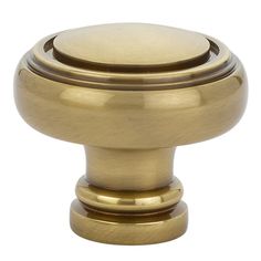 an antique brass door knob on a white background