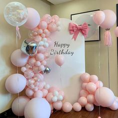 a birthday party with balloons and streamers