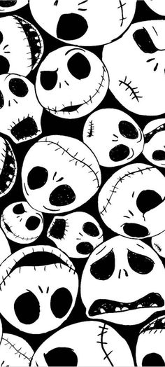 black and white skulls with faces drawn on them, as if they were in the style of jack skelling