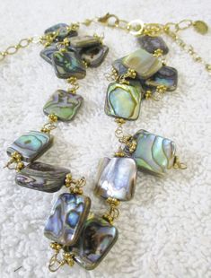 "Michelle Roy Gold Leaf and Multi Color Ammolite Gemstone Double Necklace with gift box The gold necklace measures 19.5\". The ammolite necklace measures 16\"." Gucci Coat, Double Necklace, Canvas Clutch, May 22, Fort Lauderdale, Gold Leaf, Pendant Necklaces, Necklace Lengths, Clutch Bag