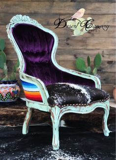 an old chair with purple velvet upholstered on it