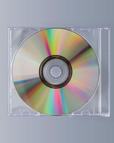 an empty cd case is shown with the disc in it's center and bottom corner