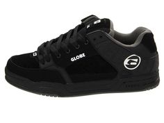 a black and grey shoe with the word globe on it