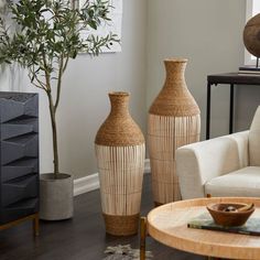 a living room filled with furniture and vases