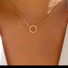 Beautiful Necklace With Rhinestones. Has A Round Circle In The Middle. Gold Chain Measures 18" Long. Diamond Clavicle Chain Necklace For Party, Party Diamond Necklace With Clavicle Chain, Dainty Round Rhinestone Jewelry, Circular Necklaces With Diamond Accents For Gifts, Gold Necklace With Rhinestones, Gold Circle Diamond Necklace, Diamond Circle Necklace, Circle Diamond, Round Circle