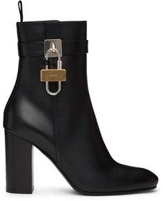 Ankle-high buffed calfskin boots in black. Almond toe. Integrated strap at collar. Detachable logo-engraved lock-style hardware with spring fastening at outer side. Zip closure at inner side. Tonal goatskin lining. Stacked leather heel. Tonal leather sole. Silver-tone and gold-tone hardware. Approx. 3.75 heel. Supplier color: Black Black Heeled Boots Outfit, Chelsea Boots Outfits, Heels Boots Outfit, Almond Toe Boots, Snow Wear, Black Heel Boots, Shoe Boot Sandals, Walker Boots, Crazy Shoes