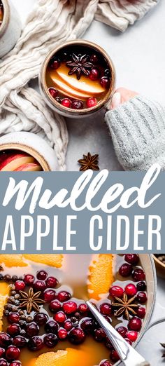 an apple cider is served with cranberries and orange slices in bowls, on top of a white table