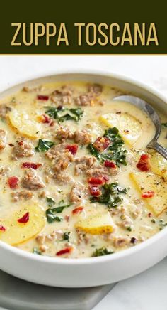 a white bowl filled with soup on top of a table