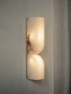 a wall light that is on the side of a wall