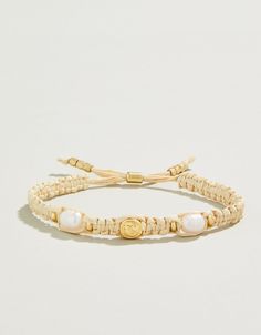 In natural Lowcountry style, our Straw Slide Bracelet features a casual laid back look with freshwater pearls and 18kt matte gold plated beads. Slide clasp adjustment for the perfect fit. Gold Beachy Bracelets For Beach Season, Beachy Gold Bracelets For Gift, Gold Bracelet For Beach Season, Beachy Gold Bracelets For Vacation, Beachy Gold Bracelets With Shell, Preppy Jewlery, Lowcountry Style, Vacation Jewelry, Vacation Accessories