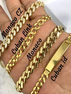 ● Mens 14k Solid Gold Bracelet Monaco Curb Link Cuban ID Engravable Bracelet Fathers Day Gift ●Metal : 14K Yellow Gold ●Purity : 14k with authenticity stamp ●Thickness, Length and Weight: Monaco CZ: 9mm, 8.5", 19 Grams Cuban Link: 8mm, 8", 12.2 Grams Monaco: 10mm, 8.5", 14.4 Grams Cuban ID Link: 7mm, 8", 12 Grams ( FREE Engraving) Message us the font that is needed for engraving. This item is non returnable if engraving is needed. ●Condition : Brand New ●Clasp : Lobster Clasp/ Box CZ Clasp ●Comp Formal Luxury Cuban Link Bracelet, Luxury Gold Plated Classic Cuban Link Bracelet, Elegant Engraved Cuban Link Bracelet, Engraved Cuban Link Bracelets As Gift, Rectangular Gold Bracelet With 17 Jewels, Luxury Gold Bracelets With Curb Chain, Gold Diamond Bracelet With Cuban Link For Formal Occasions, Formal Gold Diamond Bracelet With Cuban Link, Cuban Link 14k White Gold Bracelet