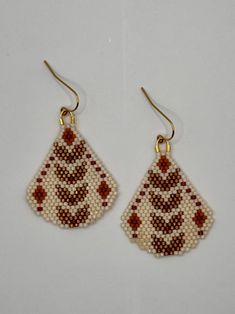 Hand beaded earrings made in my small studio at the foothills of the Sierra mountains.  These earrings are created by sewing glass seed beads with ultra-strong thread. Plated gold French style earring wires complete the design.  Other metal options are available for metal-sensitive skin- message me! Other color arrangements are available- message me!   Pattern credit to Snails & Fairy Dust Hand Beaded Earrings, Sierra Mountains, Style Français, Earring Wires, Falling Leaves, Small Studio, Fairy Dust, Hand Beading, Beaded Earrings