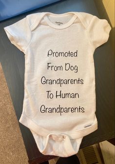 a baby's shirt that says, promote from dog grandparents to human grandparents