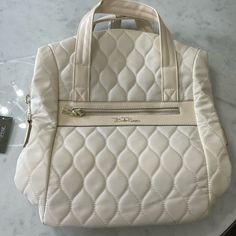 Brand New Never Been Worn Bella Russo Quilted Shoulder Bag/Backpack Elegant Top Handle Backpack For Shopping, Elegant Beige Backpack, Cream Satchel With Zipper For Travel, Cream Satchel With Zipper Closure For Travel, Cream Satchel For Travel With Zipper Closure, Luxury Cream Bag With Zipper Closure, Elegant Beige Backpack Bag, Chic Large Capacity Beige Backpack, Elegant Beige Backpack With Zipper Closure