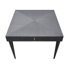 a grey table with two drawers on each side and one drawer at the top that is open