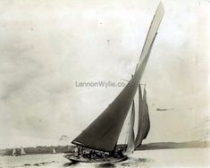 an old black and white photo of a sailboat