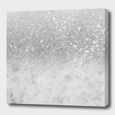 a white and gray background with lots of sparkles on the surface canvas wall art print