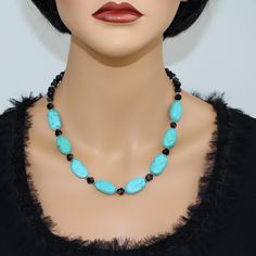 ♥ Ready to ship ♥ 100% handmade ♥ Packed in a gift box ♥ Material - Natural Turquoise, black onyx beads ♥ Custom length ♥ Custom orders are welcome Aqua Blue Turquoise and Black Beads Statement Necklace - the perfect accessory to elevate your style!  Handcrafted with care, this necklace features an exquisite combination of aqua-blue turquoise and black beads, creating a captivating color palette.  The bold design and striking contrast make this piece a true statement maker, sure to turn heads wh Elegant Turquoise Necklace With Polished Beads For Gift, Elegant Turquoise Necklace With Polished Beads As Gift, Turquoise Jewelry With Black Beads For Gift, Elegant Turquoise Necklace With Faceted Beads As Gift, Handmade Black Turquoise Necklace With Round Beads, Artisan Black Beaded Necklace For Gift, Elegant Turquoise Jewelry With Black Beads, Handmade Adjustable Black Turquoise Necklace, Turquoise Beaded Necklaces With Black Beads As Gift