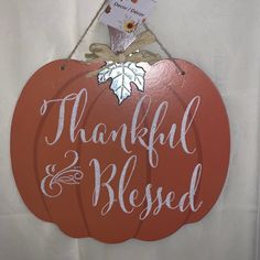 a wooden sign that says, thank you all for thanksgiving and the rest of the year