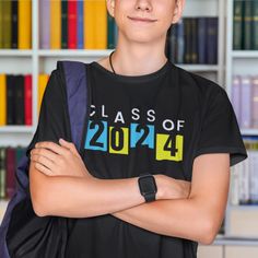 Introducing the Gildan 5000 T-shirt: "Class of 2024" Edition – the perfect way to commemorate your journey and celebrate your academic milestone in style! 🎓 Timeless Keepsake: Mark your place in history with this "Class of 2024" T-shirt, a timeless keepsake that will remind you of your academic achievements and the memories made along the way. 👕 Superior Comfort: Crafted from Gildan's trusted 100% cotton fabric, this T-shirt offers unparalleled comfort and breathability. Whether you're wearing it to class, events, or casual outings, it's perfect for all-day wear. 🌟 Classic Design: The "Class of 2024" design is elegantly simple, allowing you to showcase your graduation year with pride and style. It's a classic look that never goes out of fashion. 🎁 Perfect Gift: Looking for a thoughtful Graduation Year, 2024 Design, Class Of 2024, Unisex Shorts, Perfect Shirt, Jersey Shorts, Classic Looks, Black Tee, Cotton Fiber